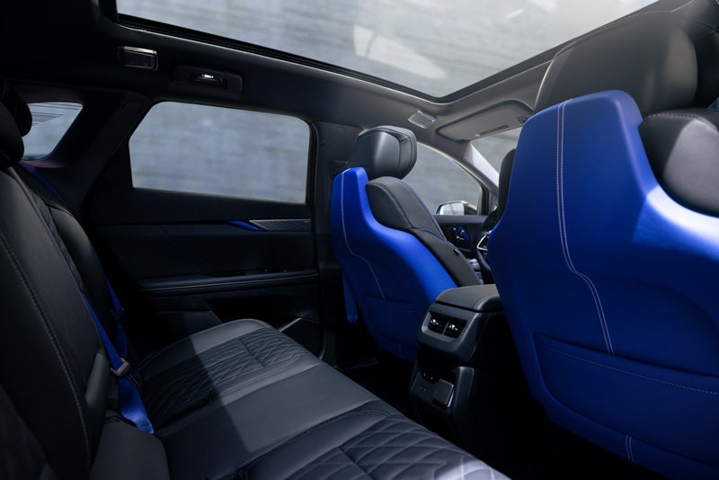 Back Seat View of the 2026 OPTIQ-V Blue Front Seats, Sun Roof, and Interior | Ingersoll Cadillac of Danbury in Danbury CT