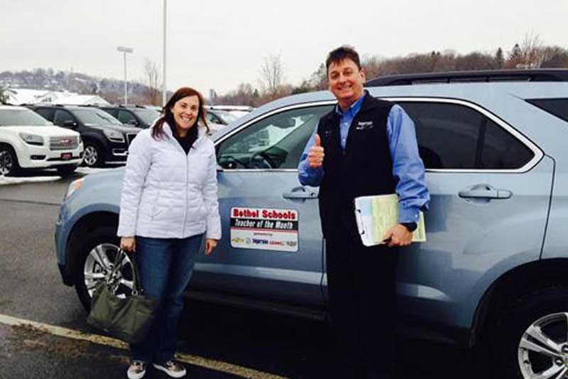 School teacher of the month gets to drive a new car from Ingersoll Cadillac of Danbury